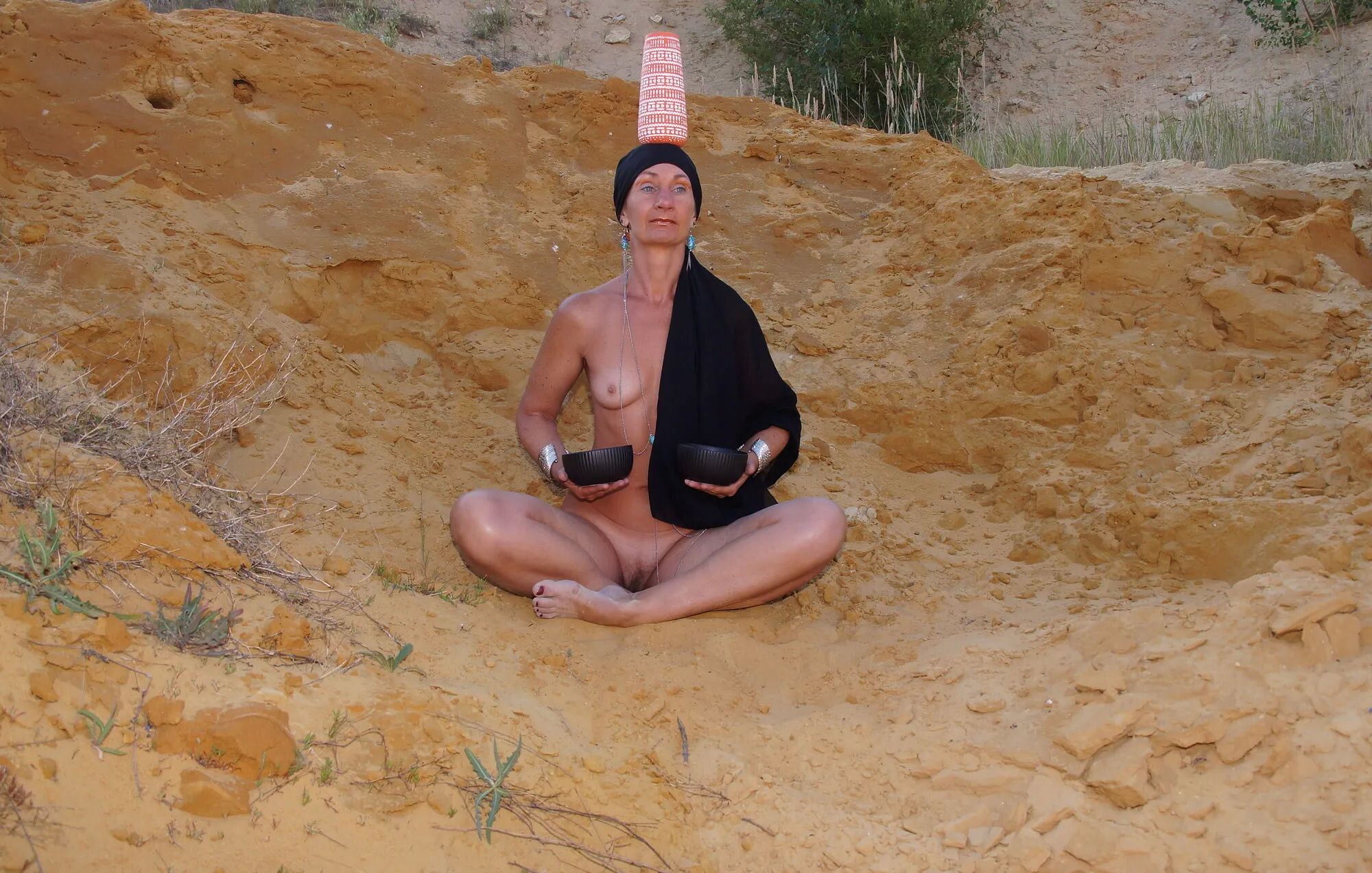 On sand seminude with light-color vase - 35 Pics