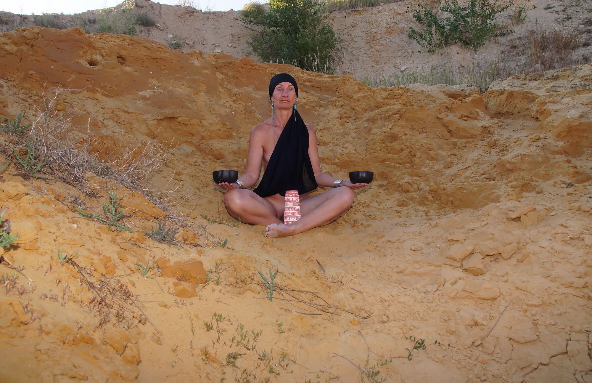 On sand seminude with light-color vase - 35 Pics