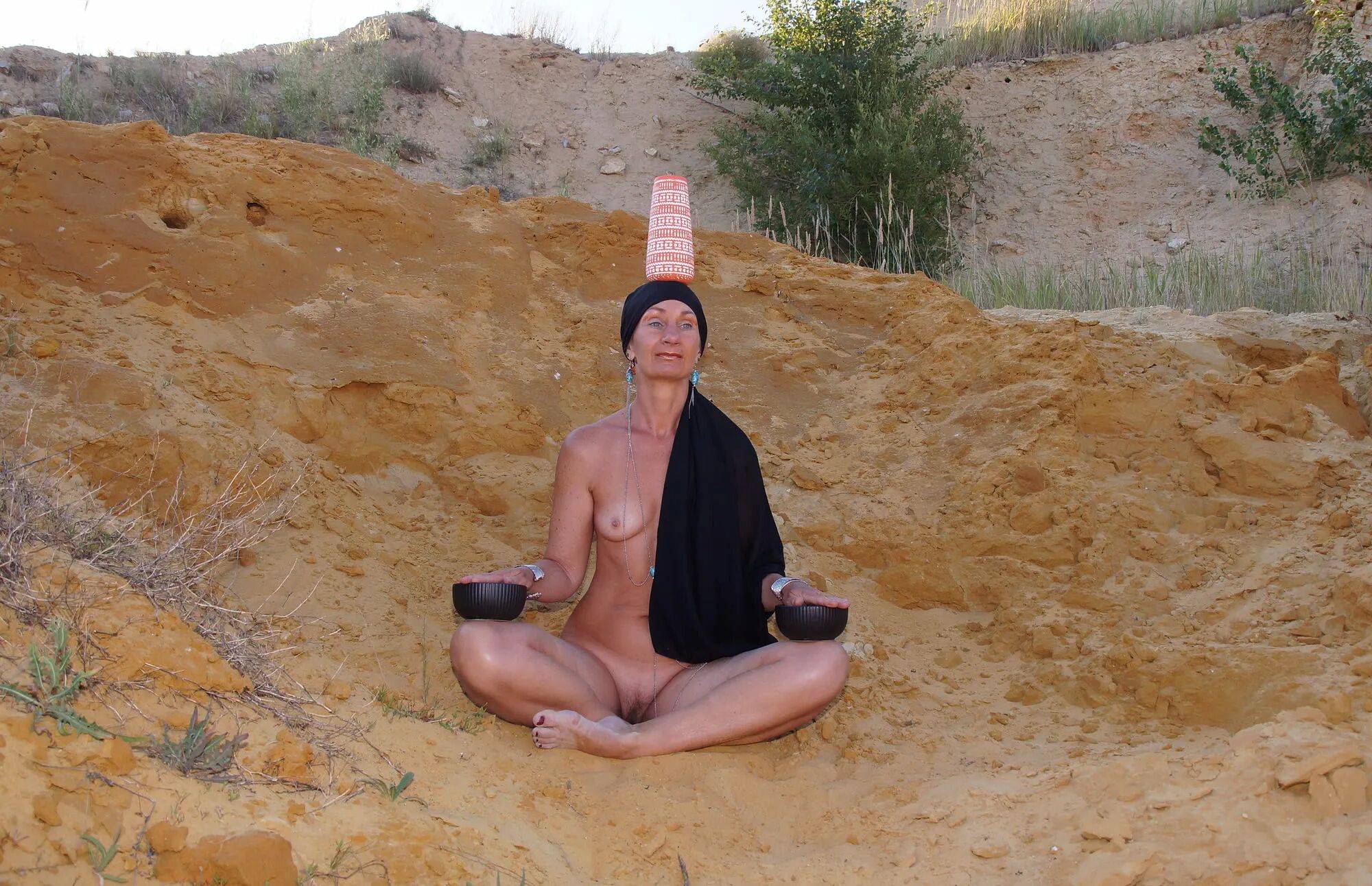 On sand seminude with light-color vase - 35 Pics