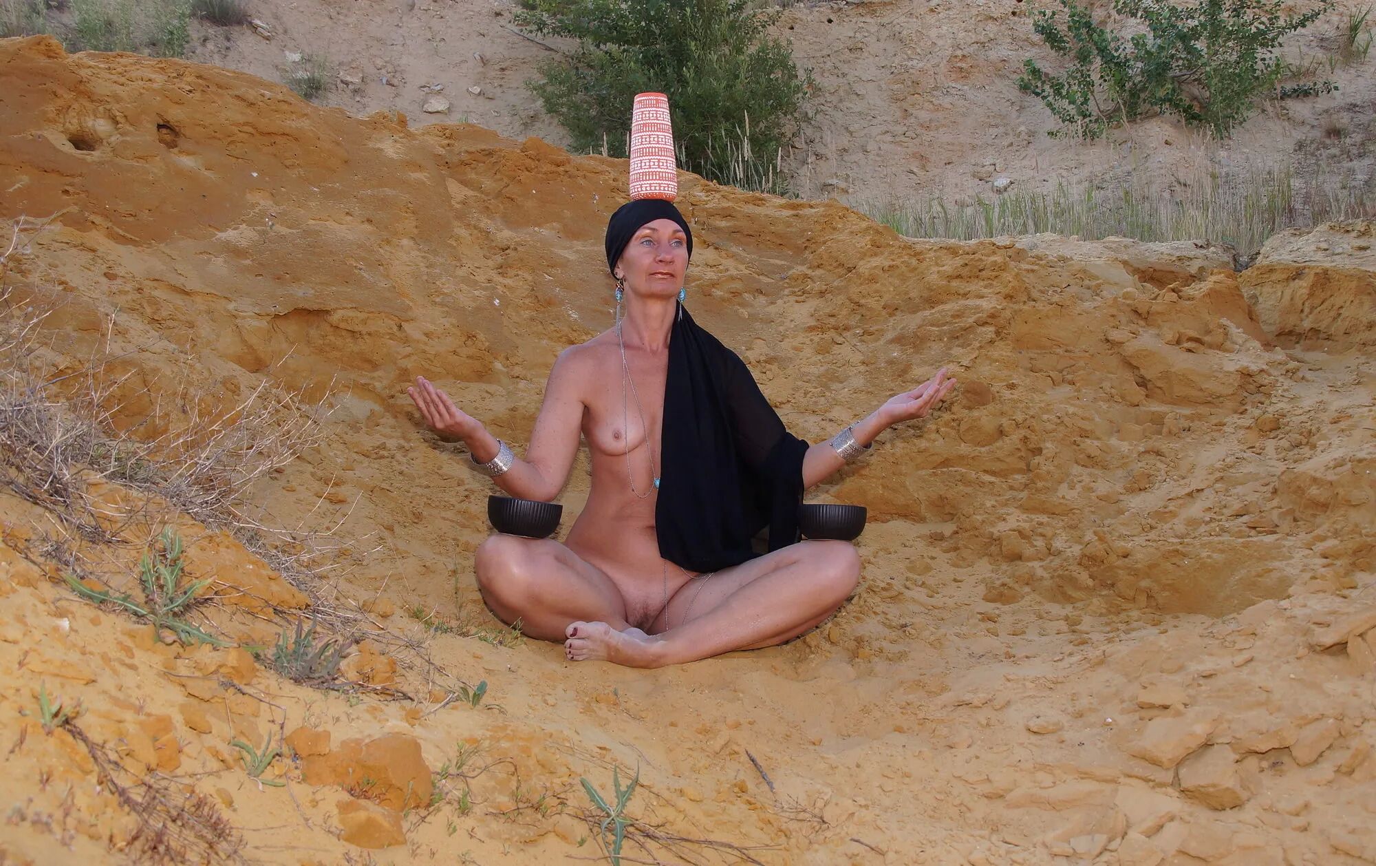 On sand seminude with light-color vase - 35 Pics
