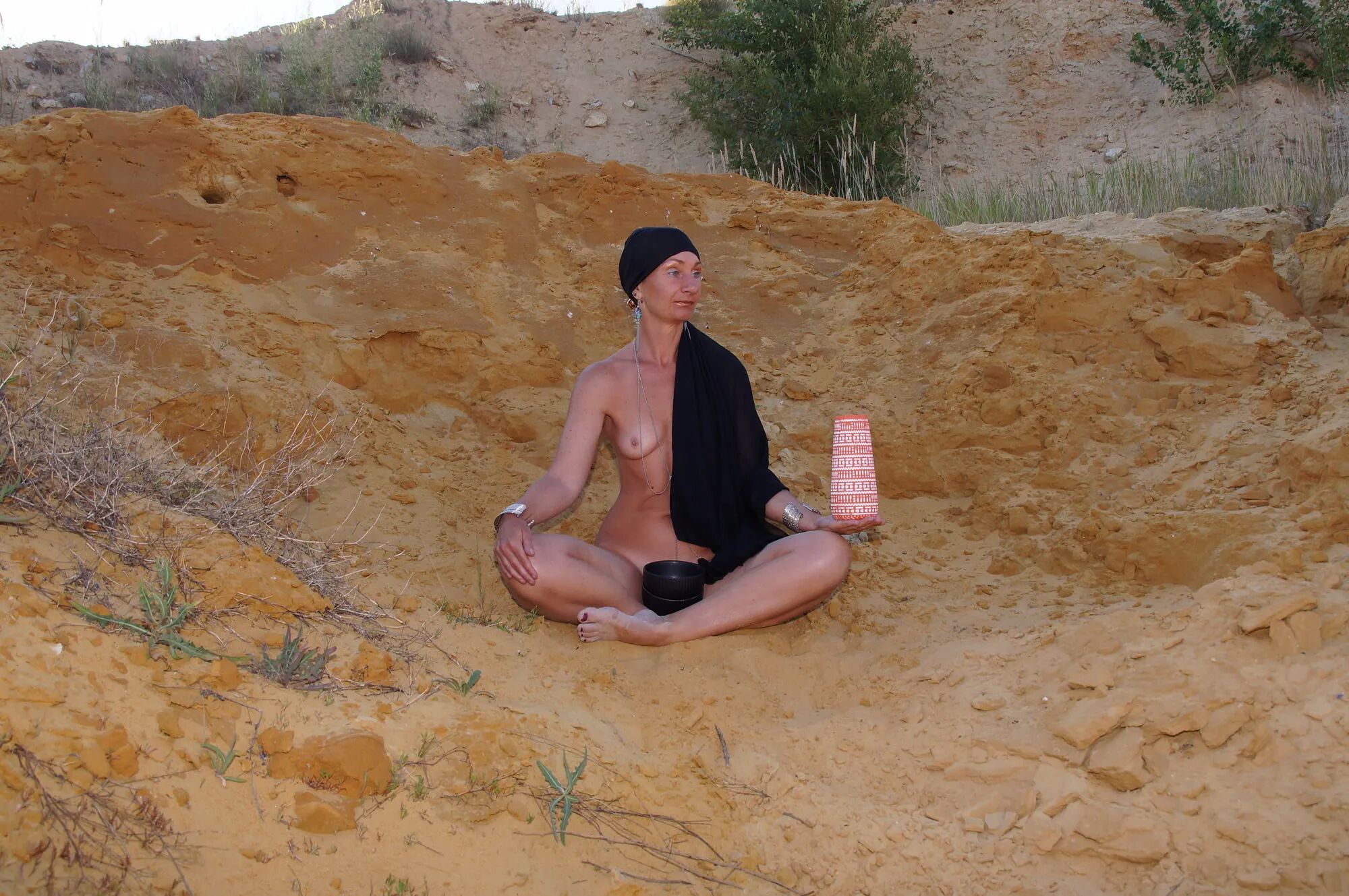 On sand seminude with light-color vase - 35 Pics