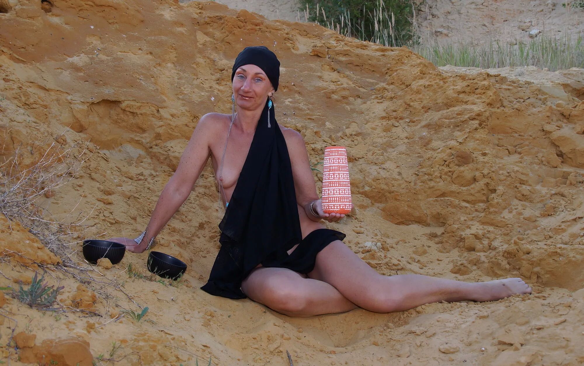 On sand seminude with light-color vase - 35 Pics