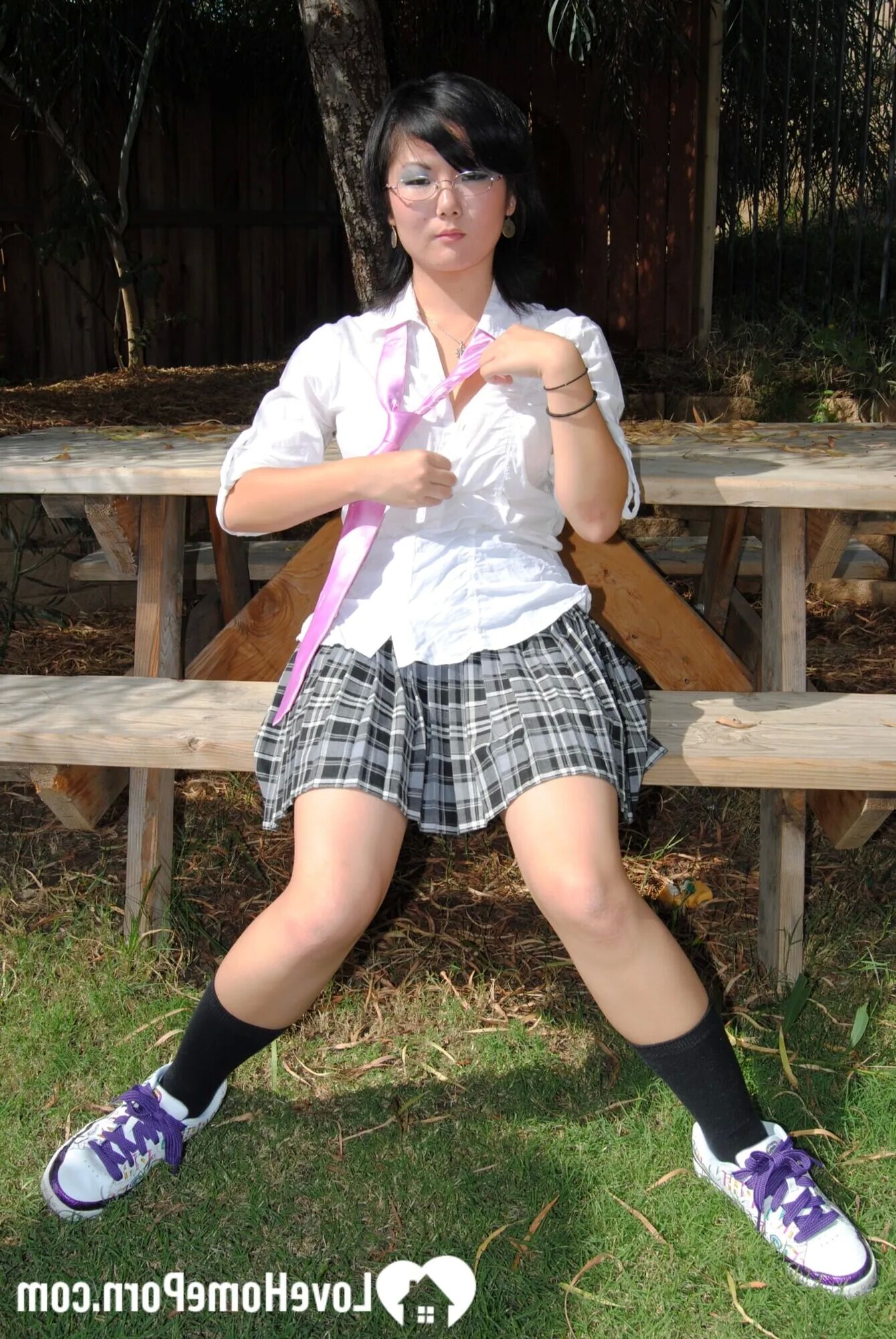 Asian schoolgirl does some hot outdoor teasing - 18 Pics