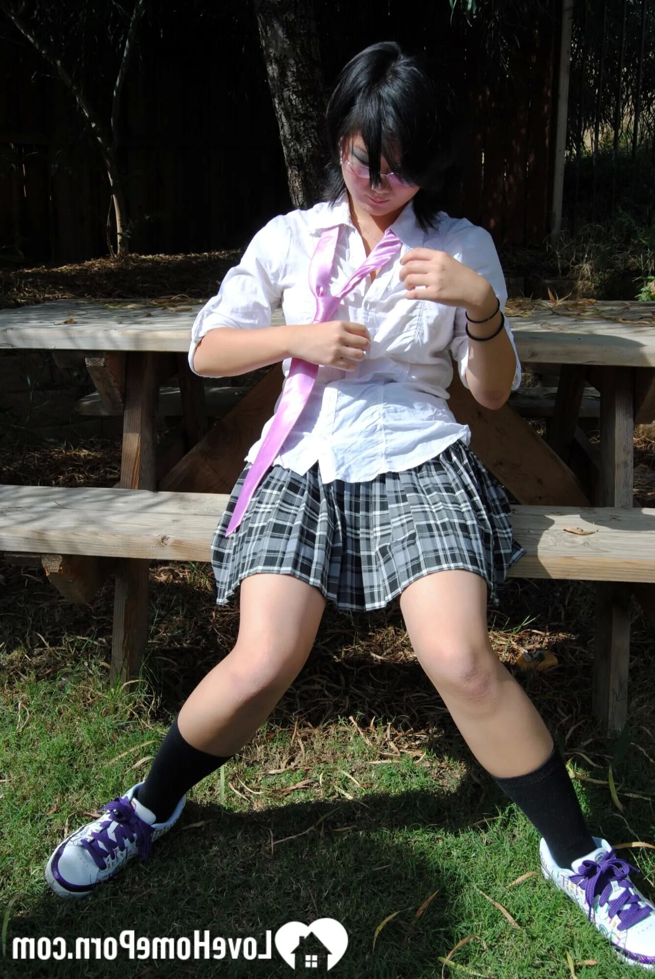 Asian schoolgirl does some hot outdoor teasing - 18 Pics