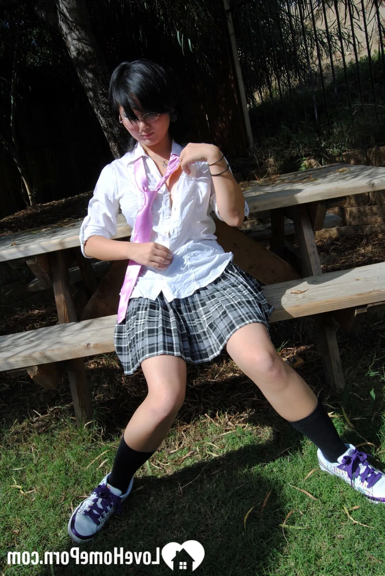 Asian schoolgirl does some hot outdoor teasing - 18 Pics