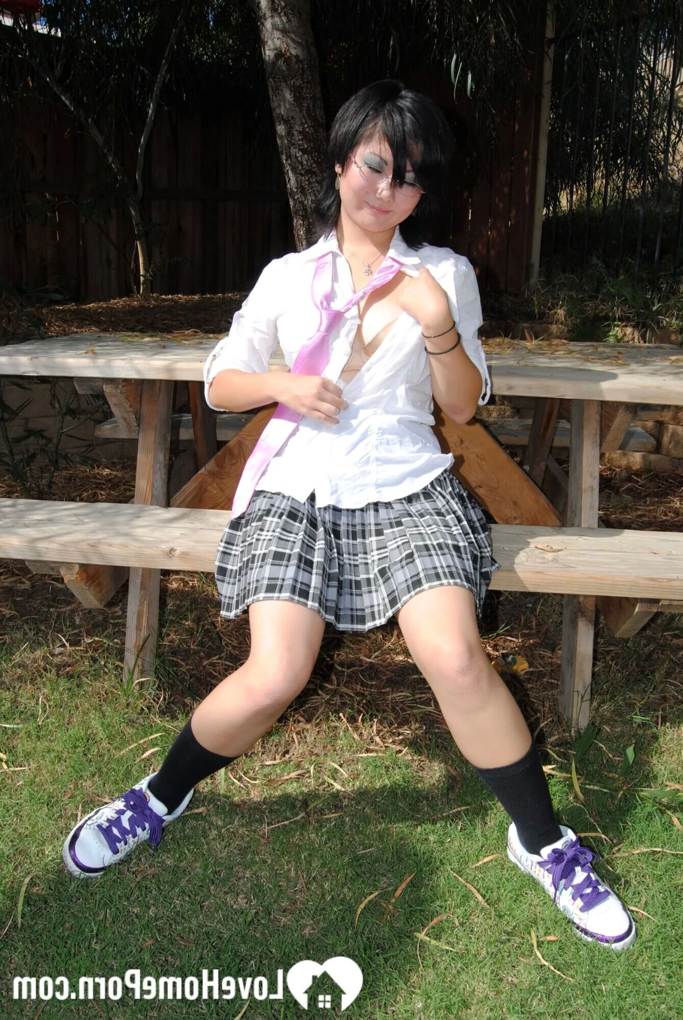 Asian schoolgirl does some hot outdoor teasing - 18 Pics
