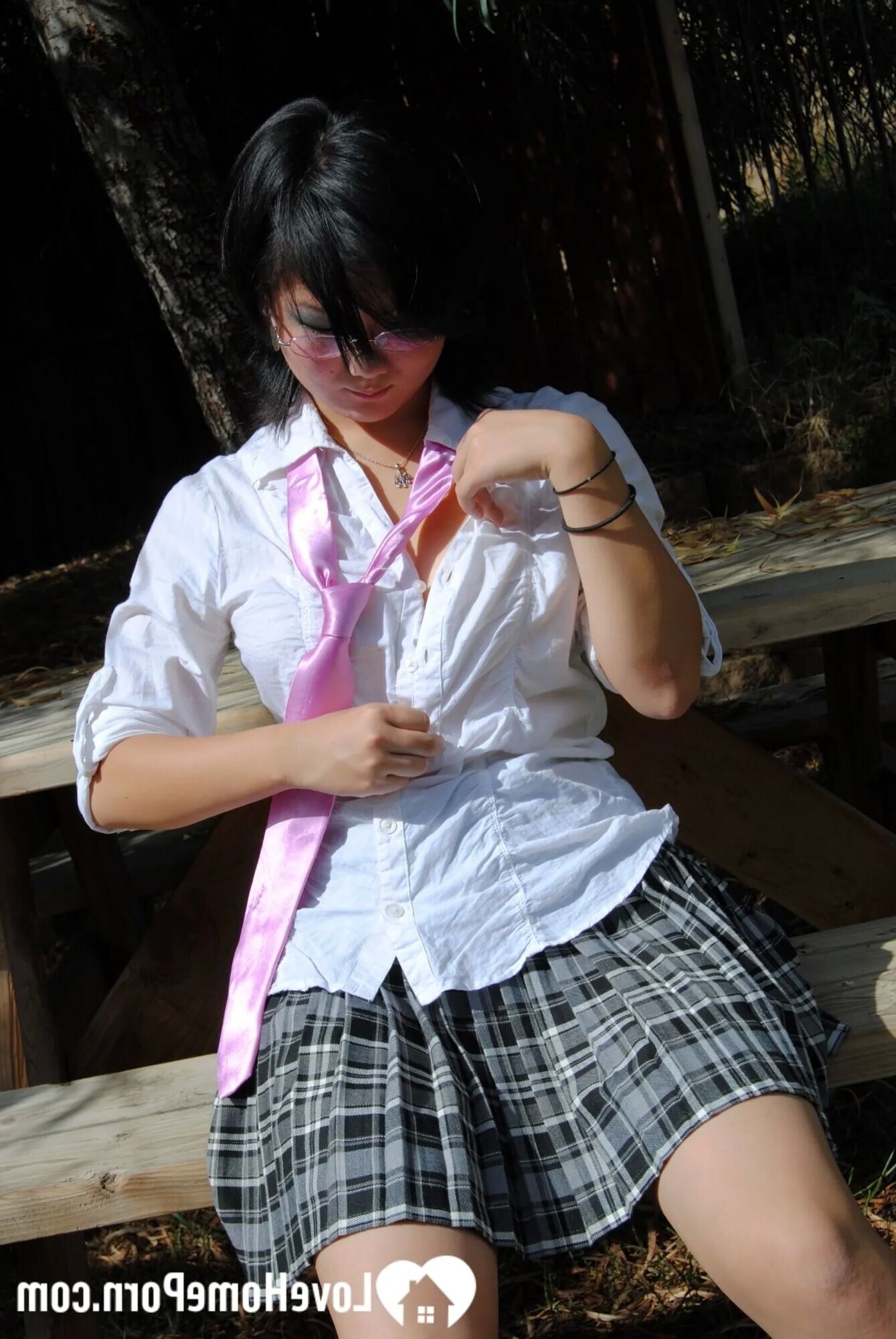 Asian schoolgirl does some hot outdoor teasing - 18 Pics