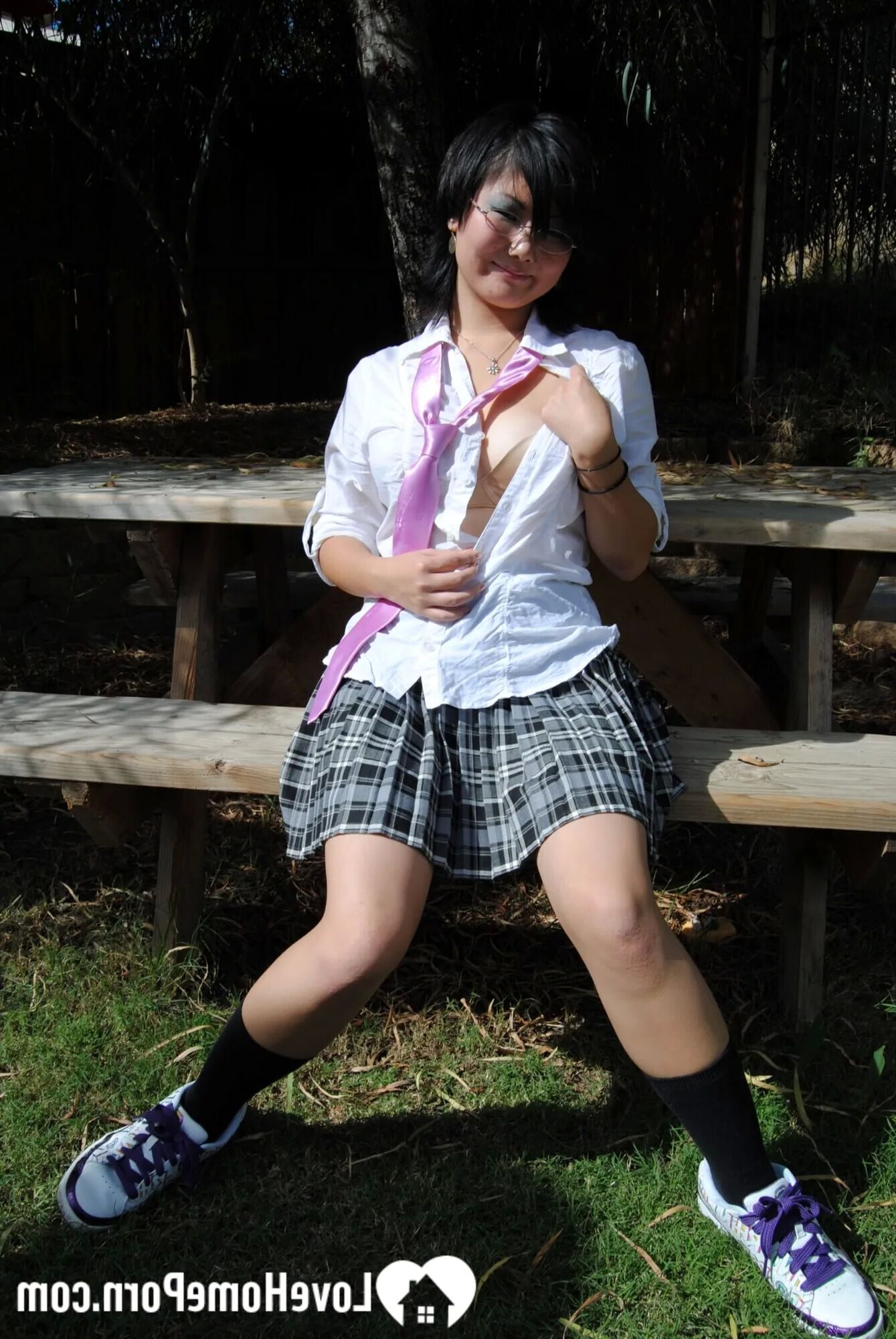 Asian schoolgirl does some hot outdoor teasing - 18 Pics