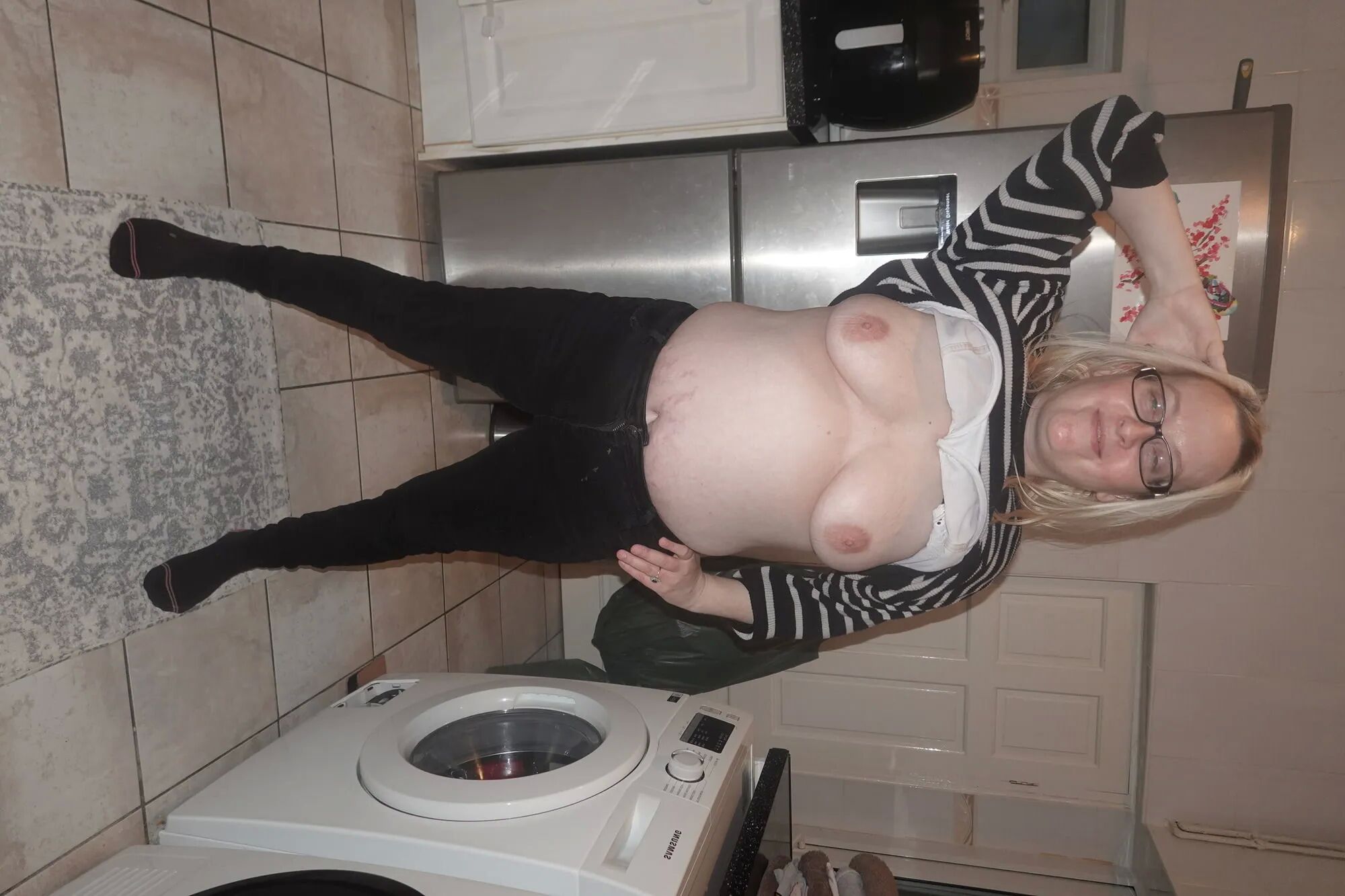 Wife showing off tits - 17 Pics