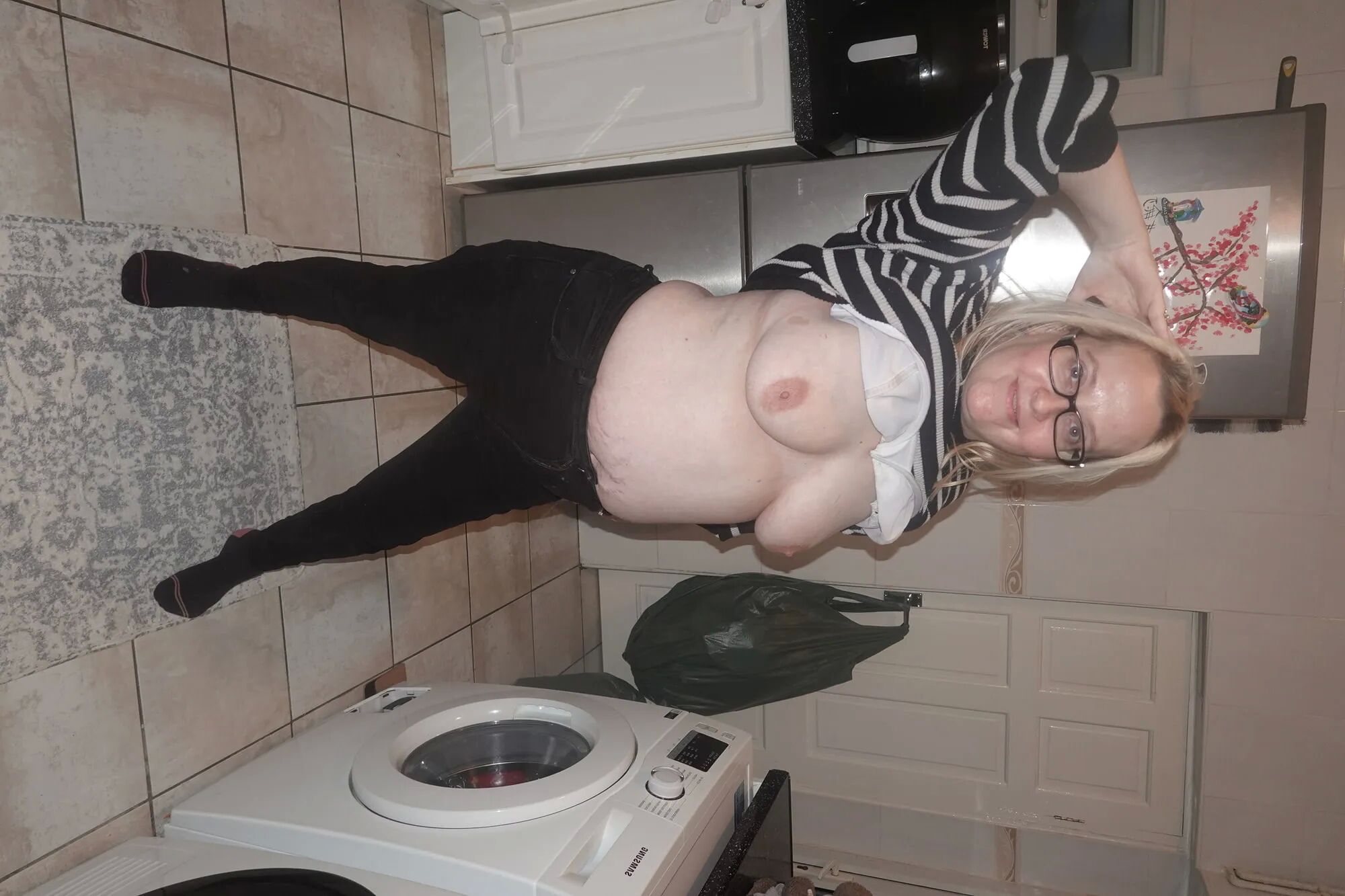 Wife showing off tits - 17 Pics