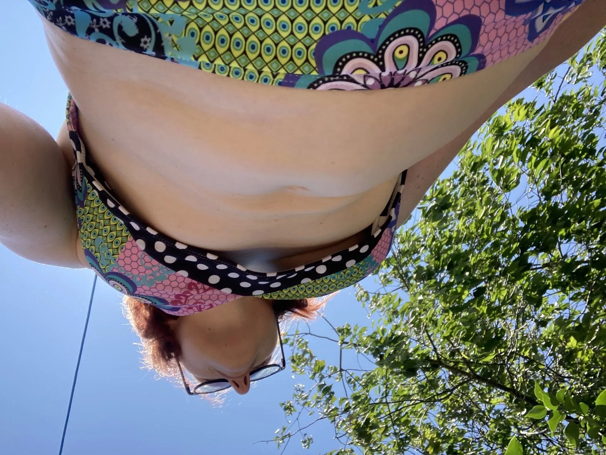 You’re laying in my garden whilst I reach over in a bikini - 25 Pics
