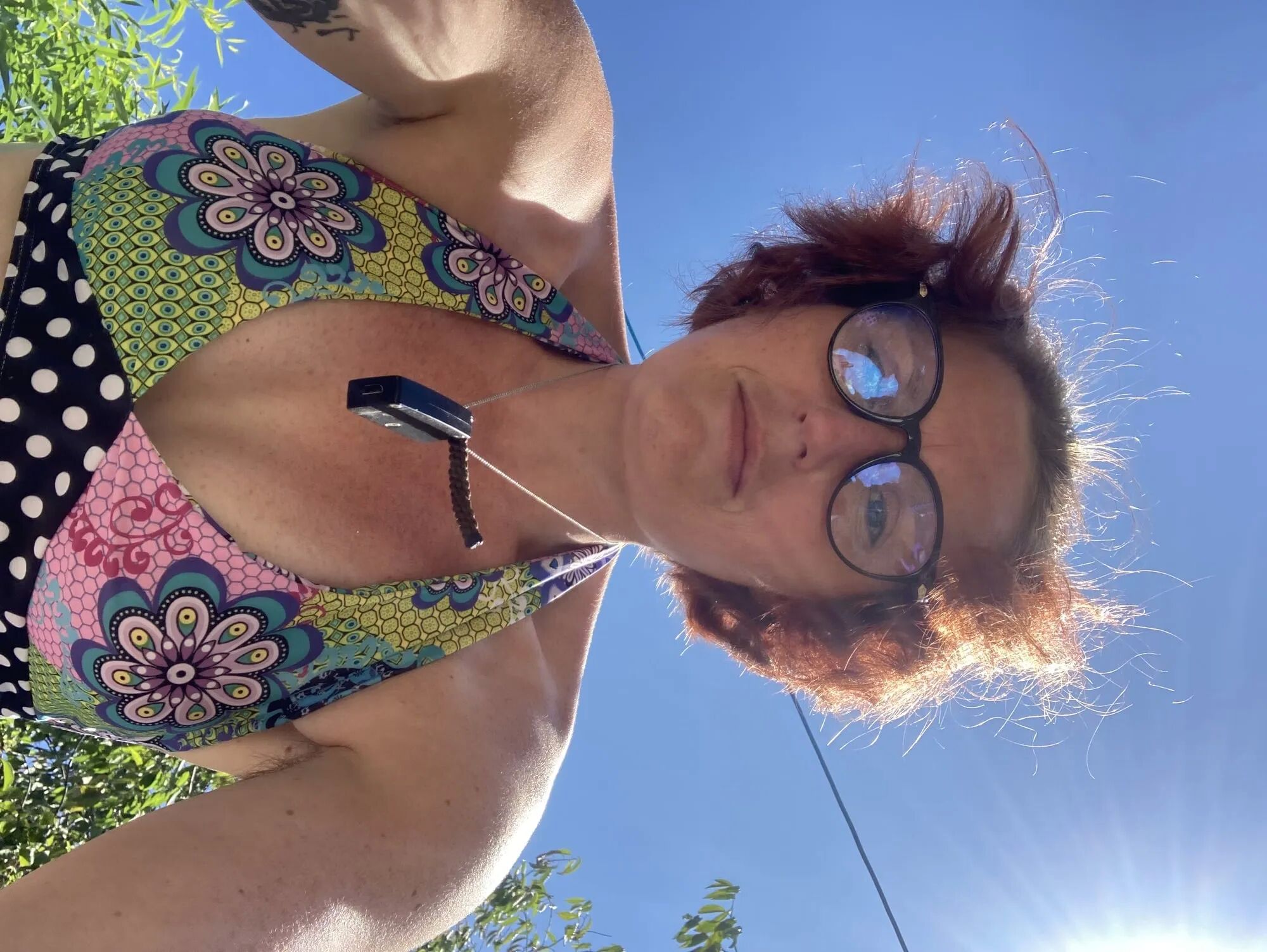 You’re laying in my garden whilst I reach over in a bikini - 25 Pics