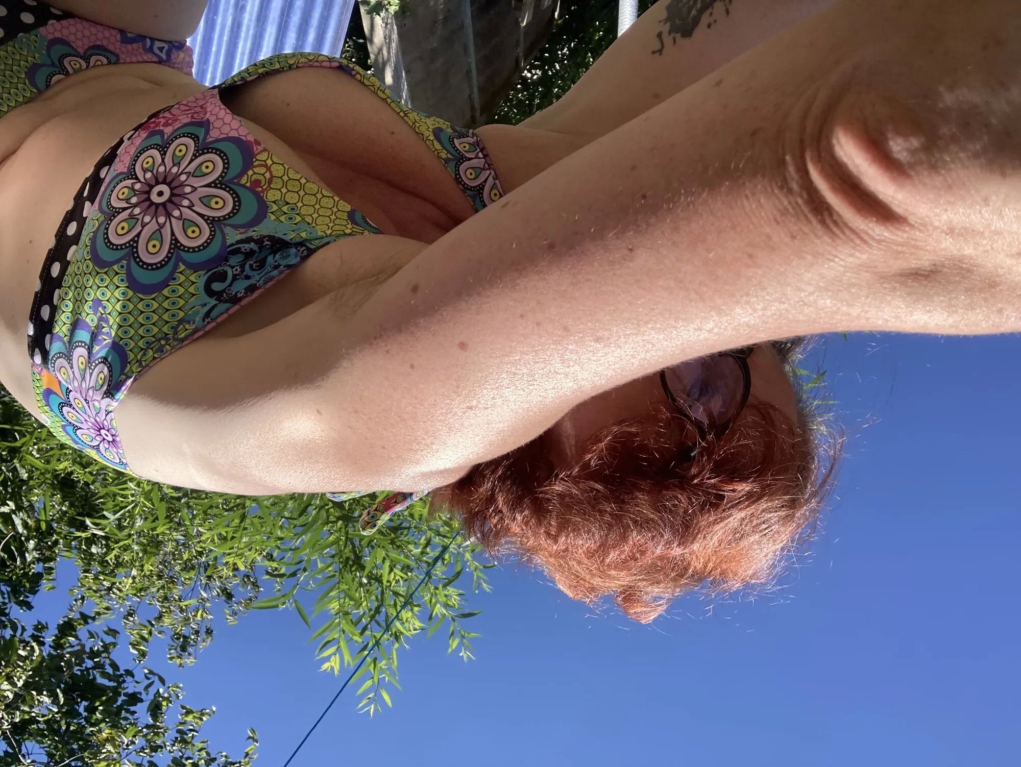 You’re laying in my garden whilst I reach over in a bikini - 25 Pics