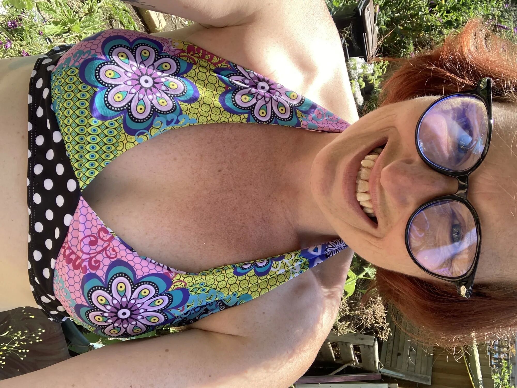 You’re laying in my garden whilst I reach over in a bikini - 25 Pics