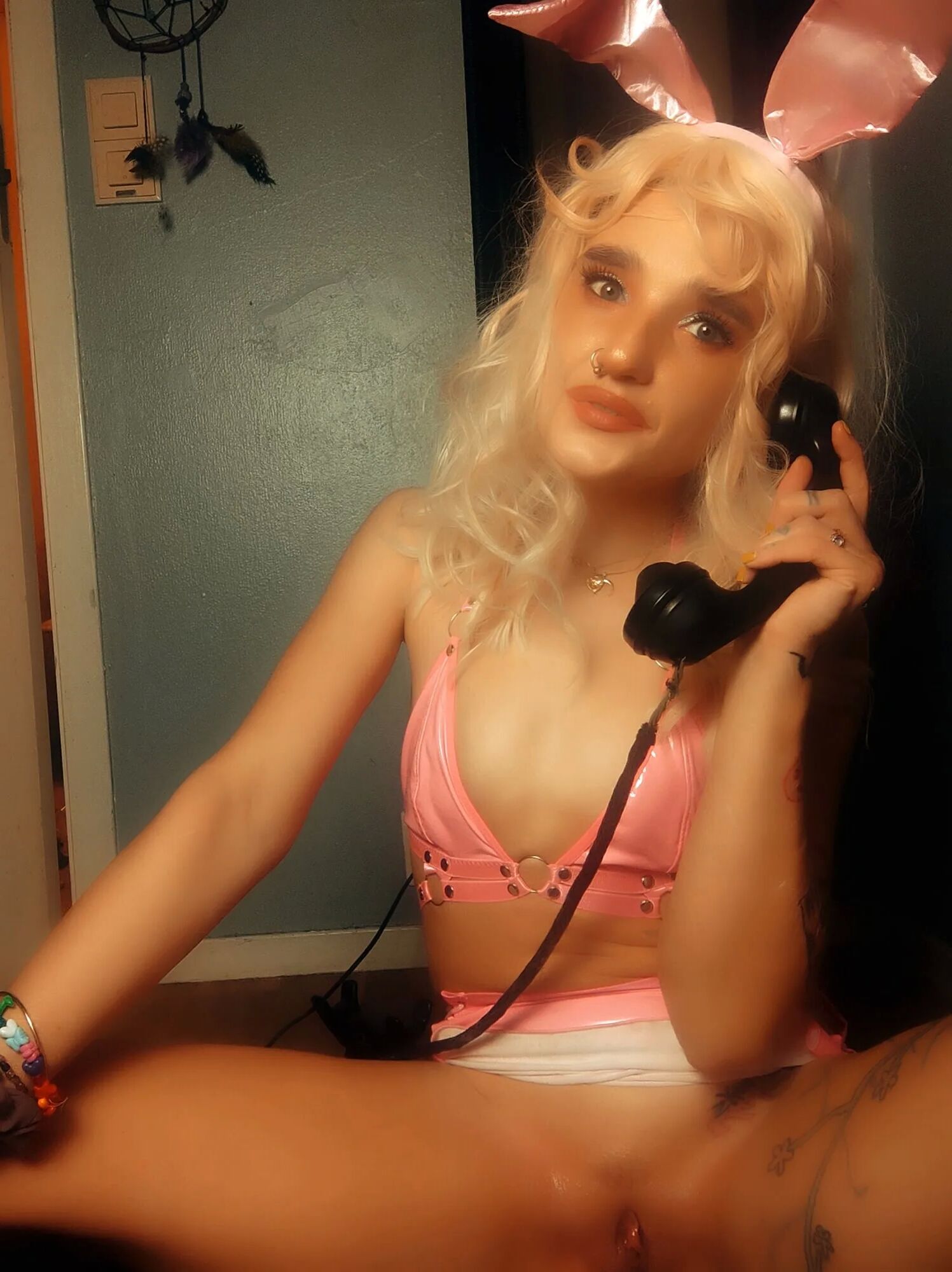 Pink bunny talking on the phone while showing off pussy - 58 Pics