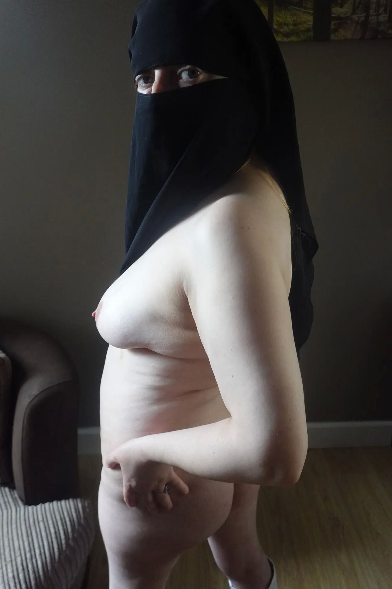 Nude in Niqab and boots - 40 Pics