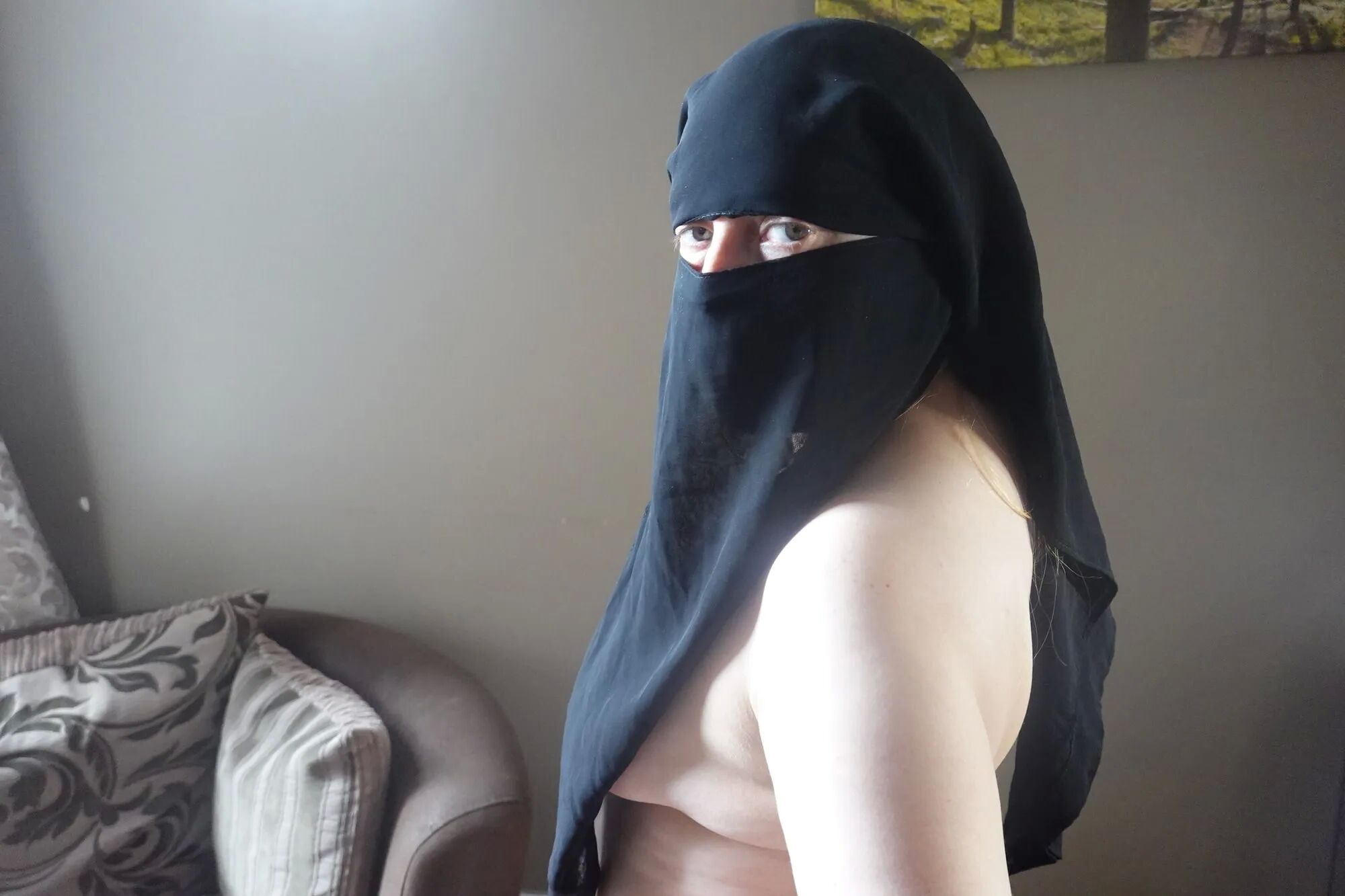 Nude in Niqab and boots - 40 Pics