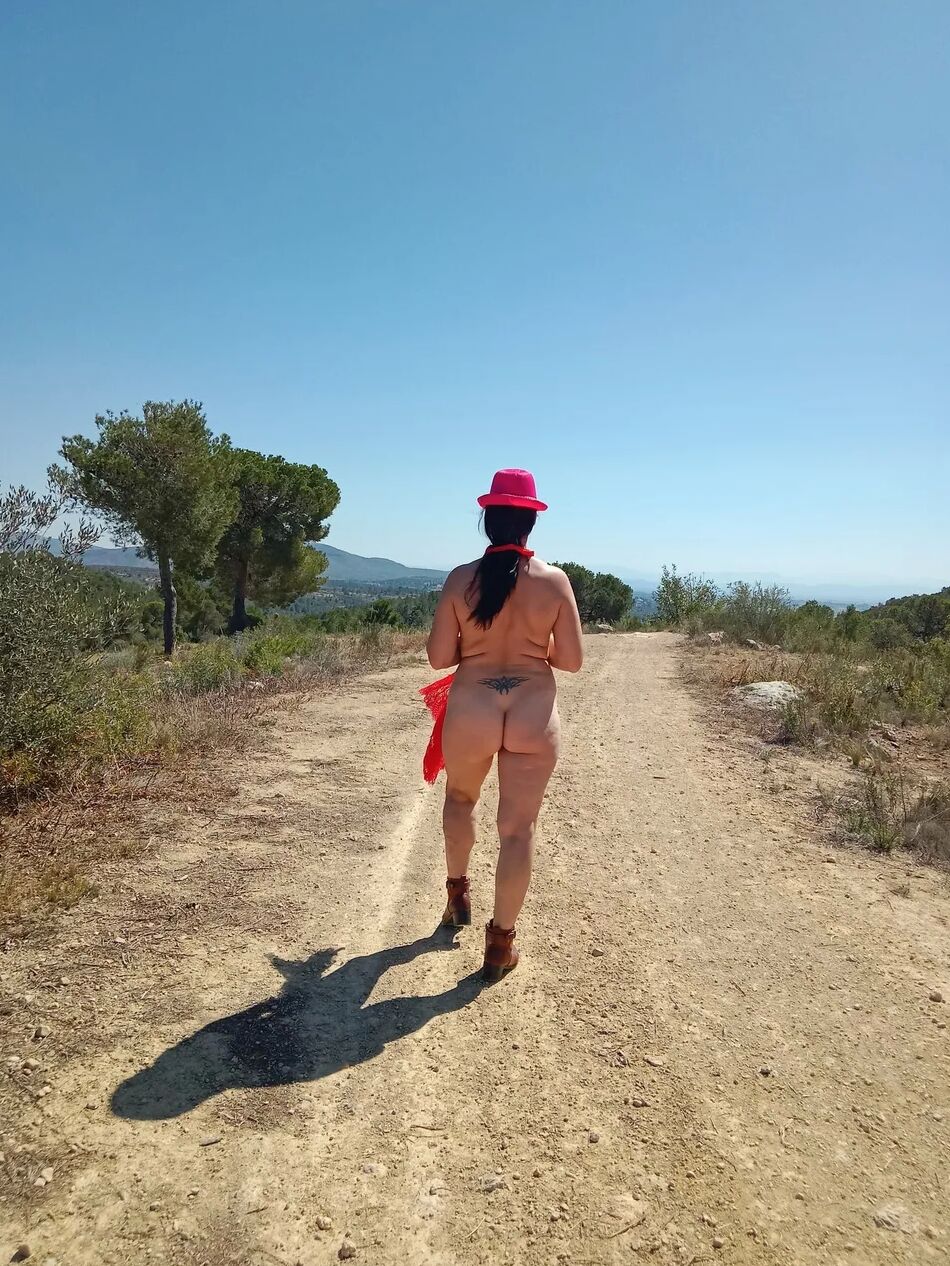 7 Pics A naked woman on a mountain top