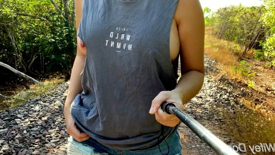 14 Pics Wifey struts her stuff in a ripped shirt