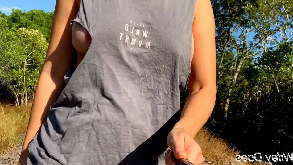 14 Pics Wifey struts her stuff in a ripped shirt