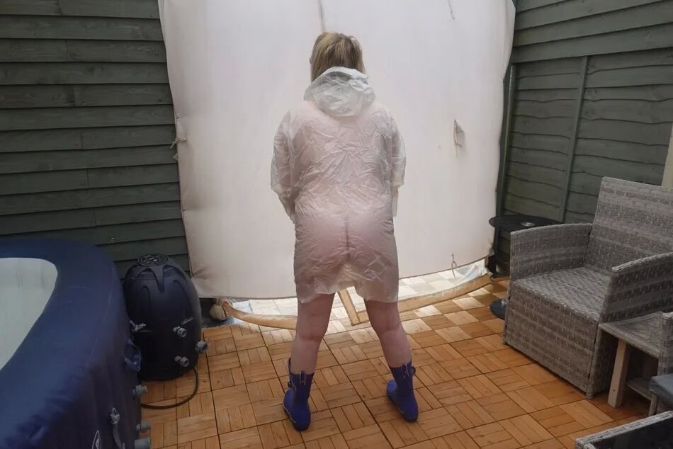 19 Pics British Tart in transparent plastic Mac and wellingtons