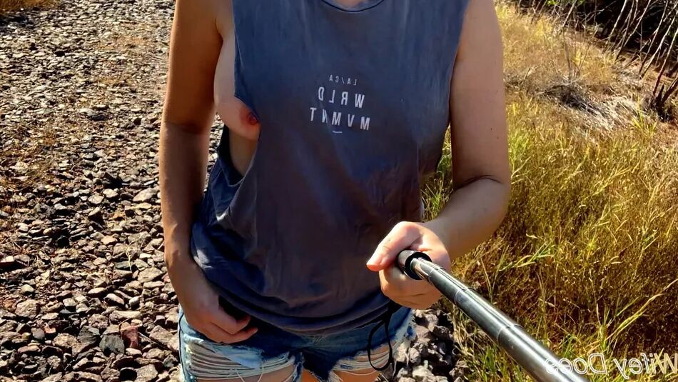 14 Pics Wifey struts her stuff in a ripped shirt