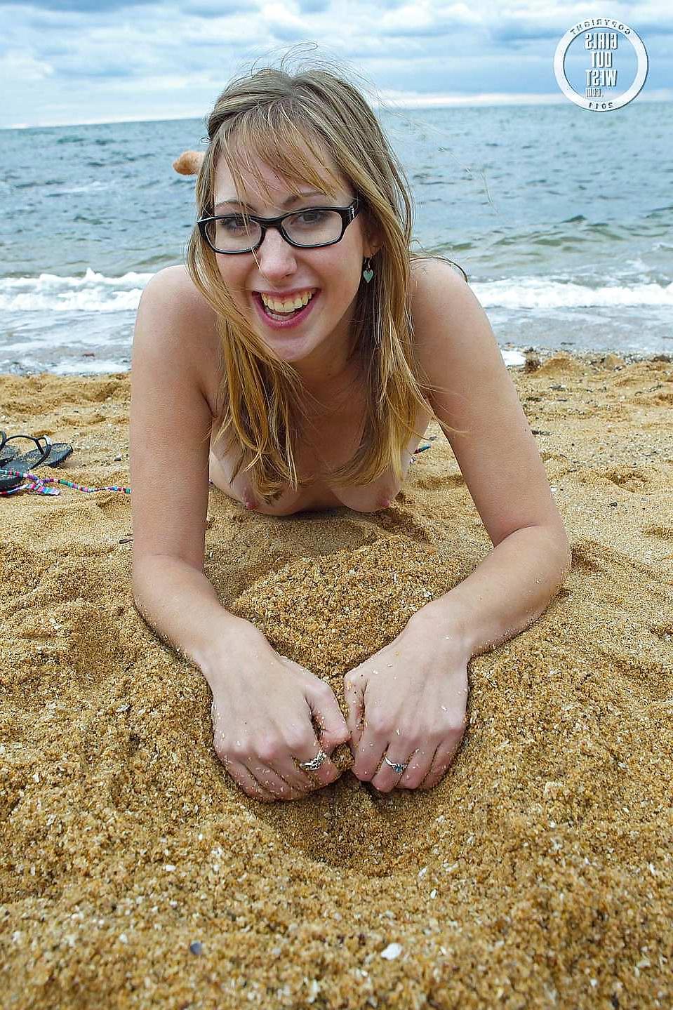 16P Lovely nerdy blondie toying her hole on the beach