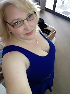 25P Adorable chubby blonde shows cleavage
