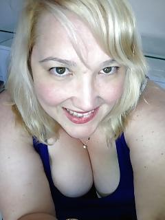 25P Adorable chubby blonde shows cleavage