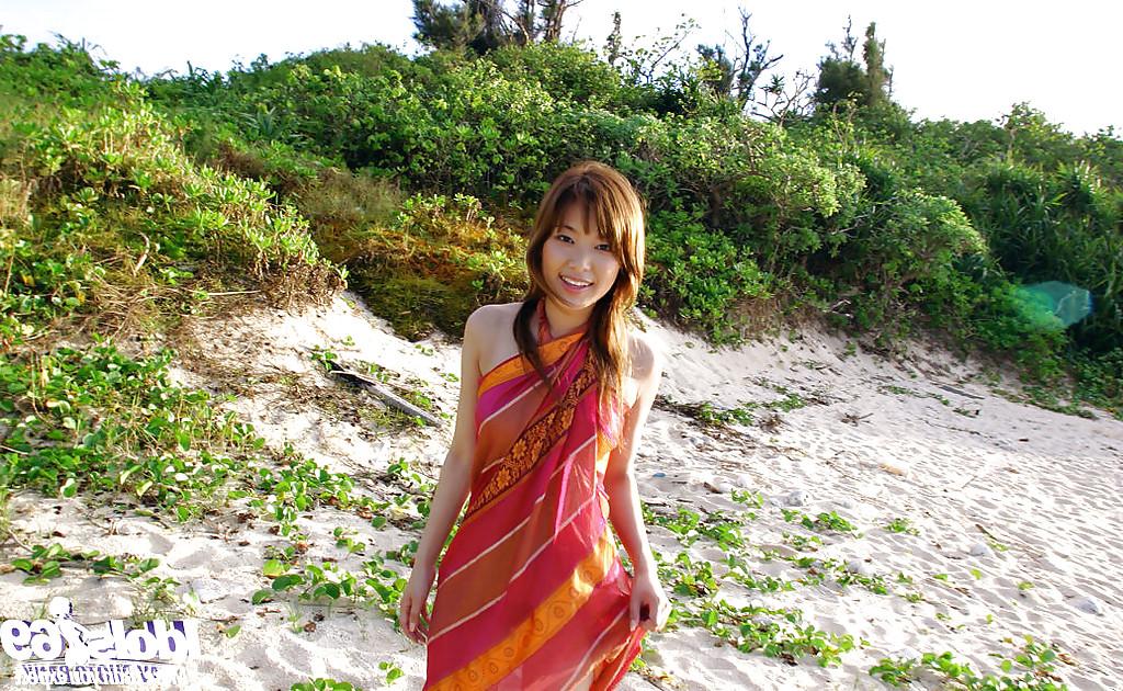 16P Adorable asian babe Yua Aida showcasing her tempting curves outdoor