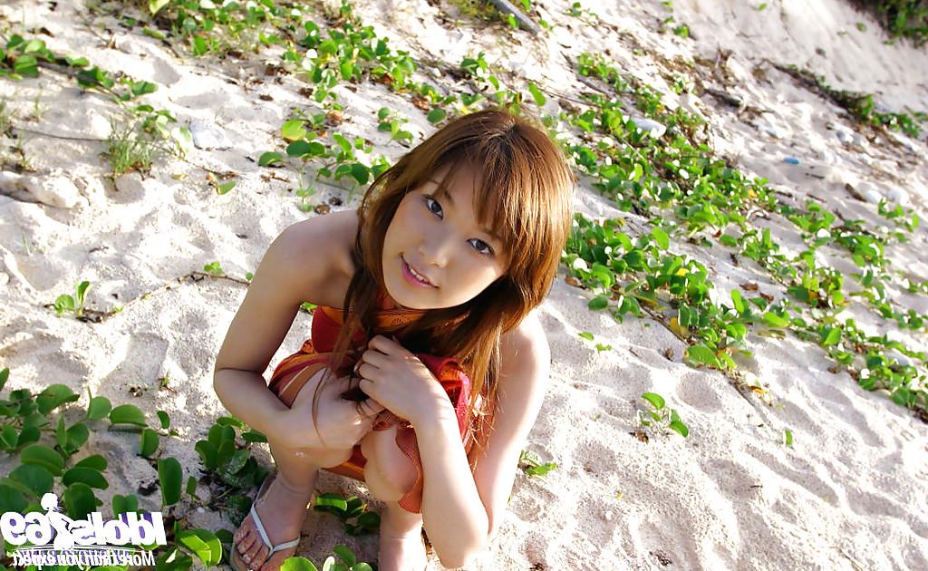 16P Adorable asian babe Yua Aida showcasing her tempting curves outdoor