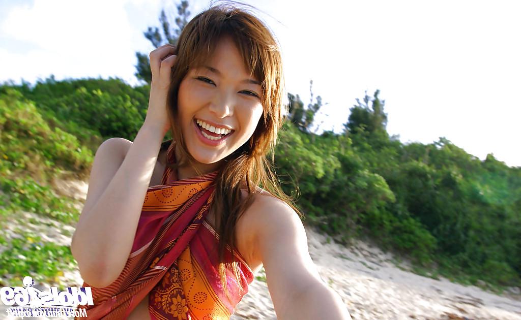 16P Adorable asian babe Yua Aida showcasing her tempting curves outdoor