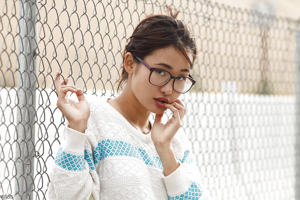 12P Adorable Asian babe Saki Kishima showcasing her amazing curves outdoors