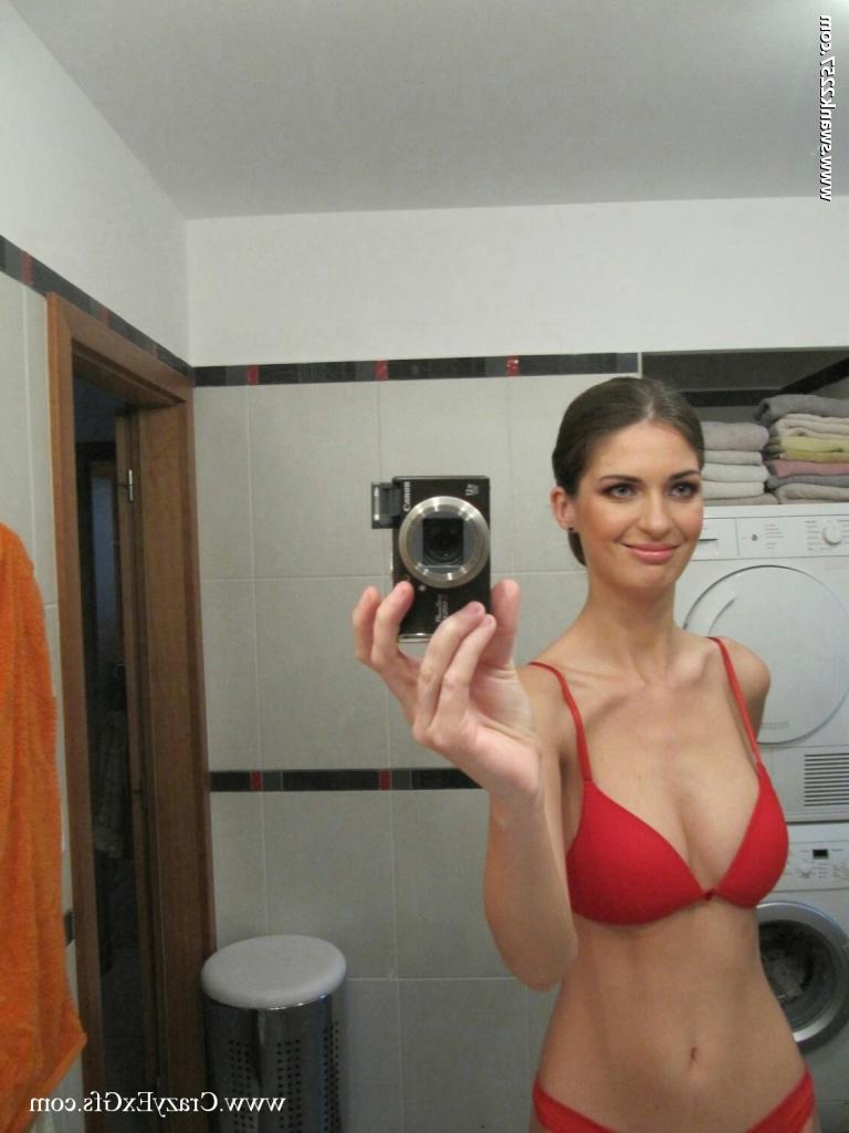 16P Adorable babe stripping in front of the mirror and picturing herself