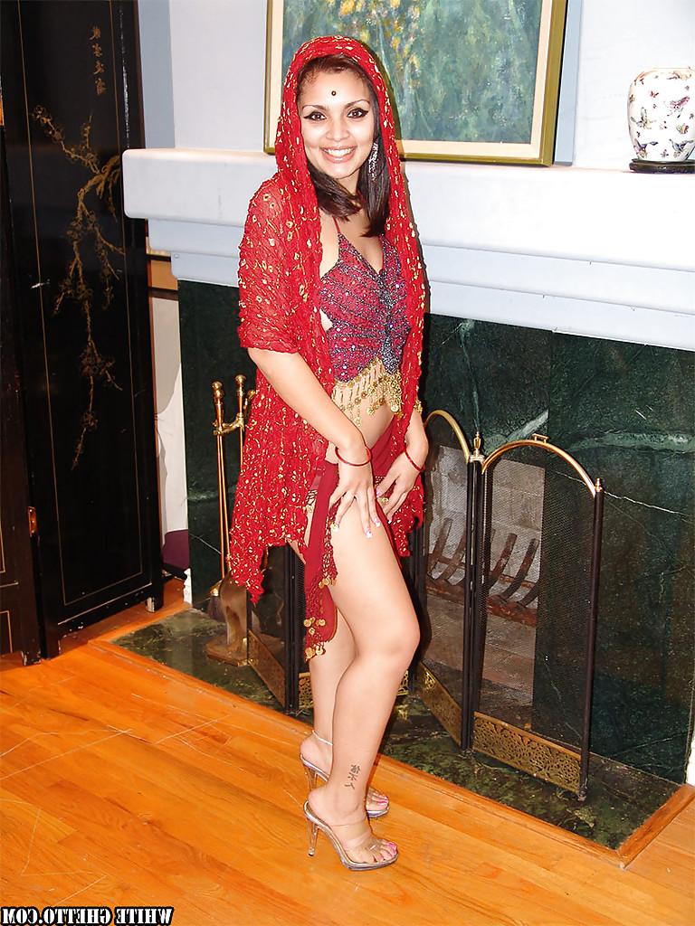 16P Adorable busty indian babe on high heels stripping and spreading her legs