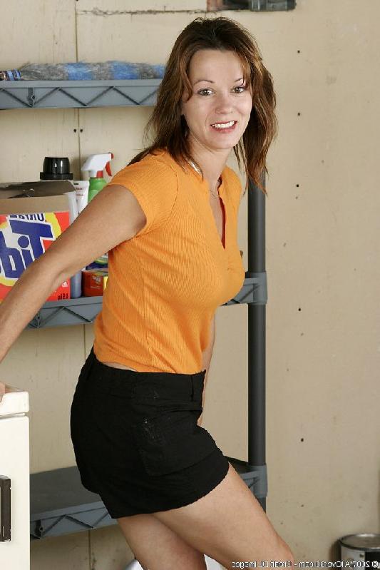 16P Adorable mom sitting on a washing machine with her boobs and small bush exposed