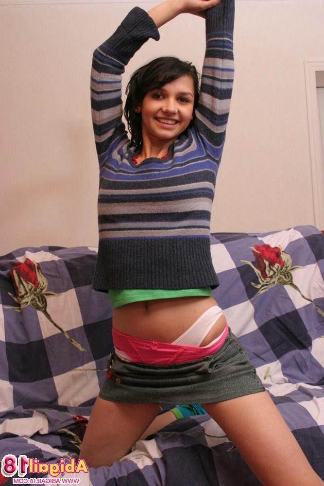 15P Adorable Abigail taking off many layers of clothes