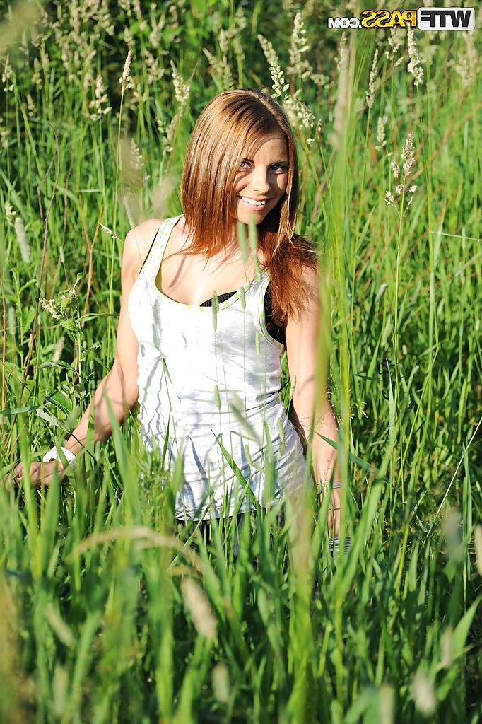 16P Loveable babe with petite tits stripping off her clothes outdoor