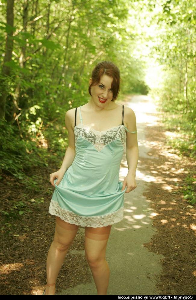 12P Adorable mature babe in stockings showcasing her lingerie outdoor