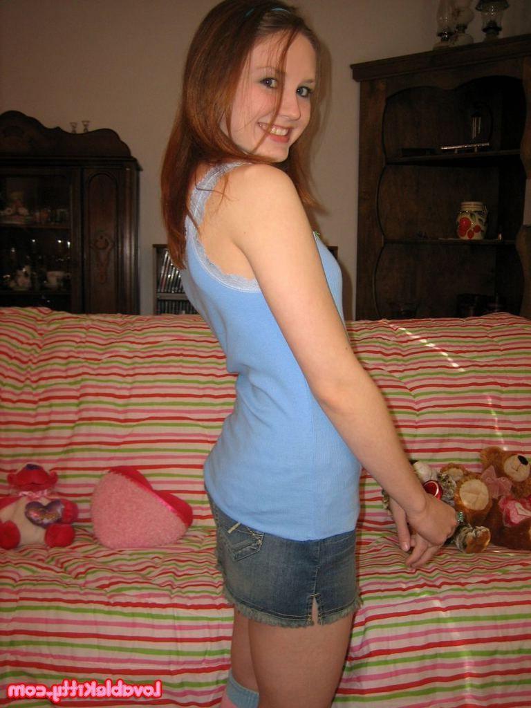15P Pictures of Lovable Kitty spreading her legs in bed