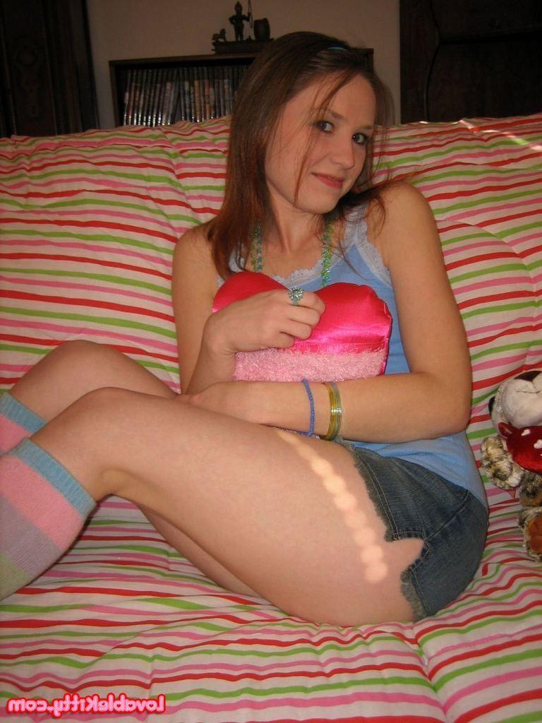 15P Pictures of Lovable Kitty spreading her legs in bed