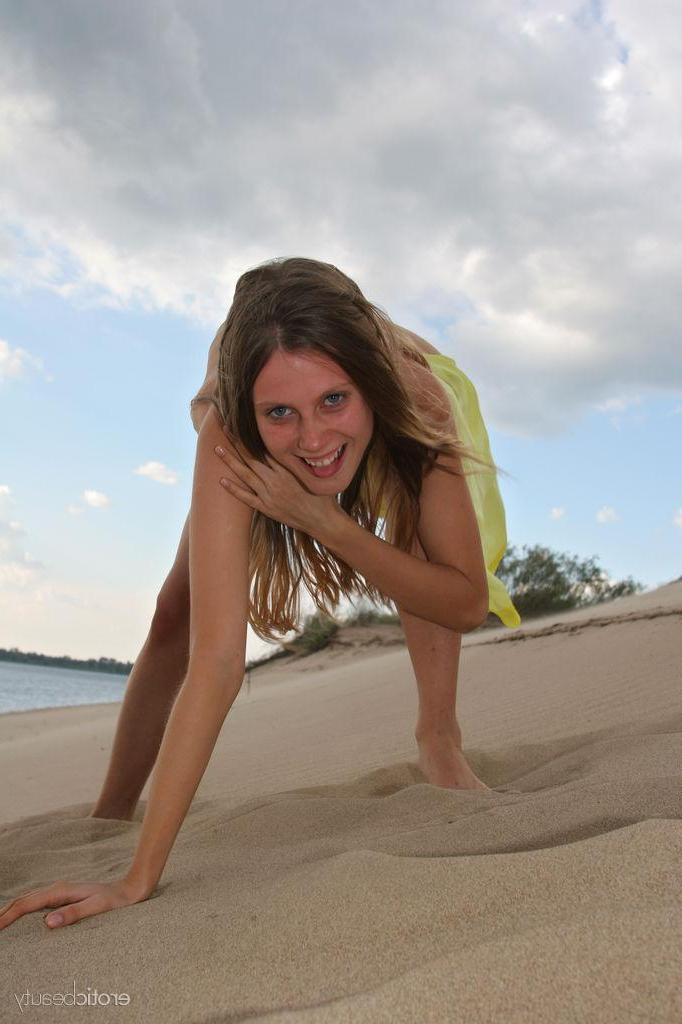 16P Petite blonde teen Kate F exposes her tight nude body on a beach