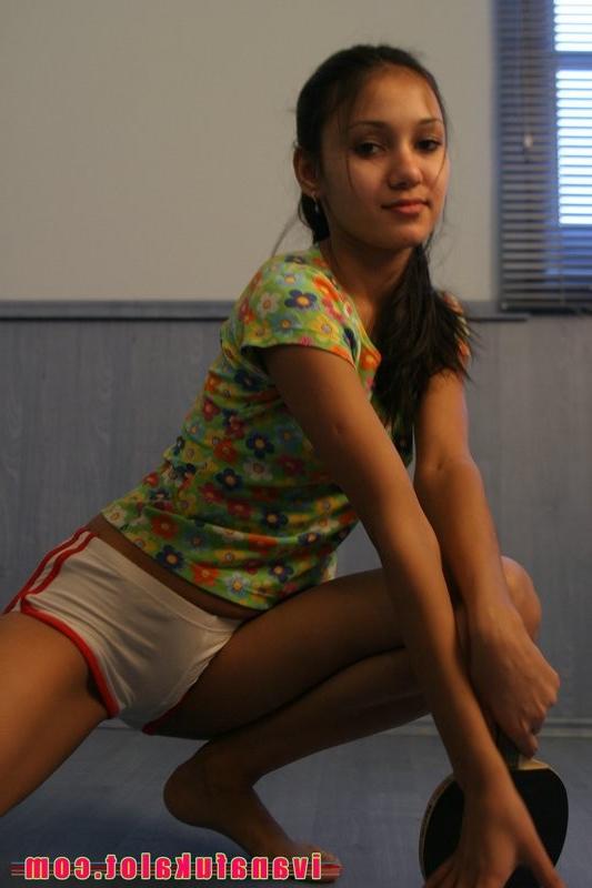 15P Adorable brunette teen posing