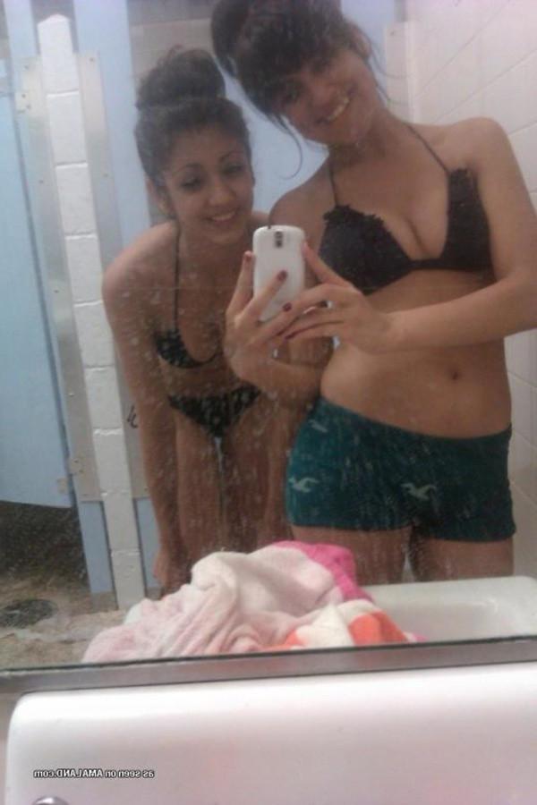 11P Gallery of a lovely brunette teen taking pics with her bff