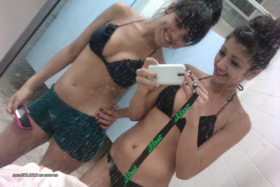 11P Gallery of a lovely brunette teen taking pics with her bff
