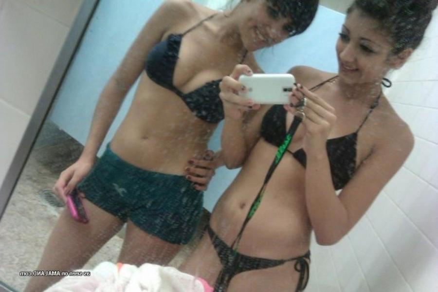 11P Gallery of a lovely brunette teen taking pics with her bff