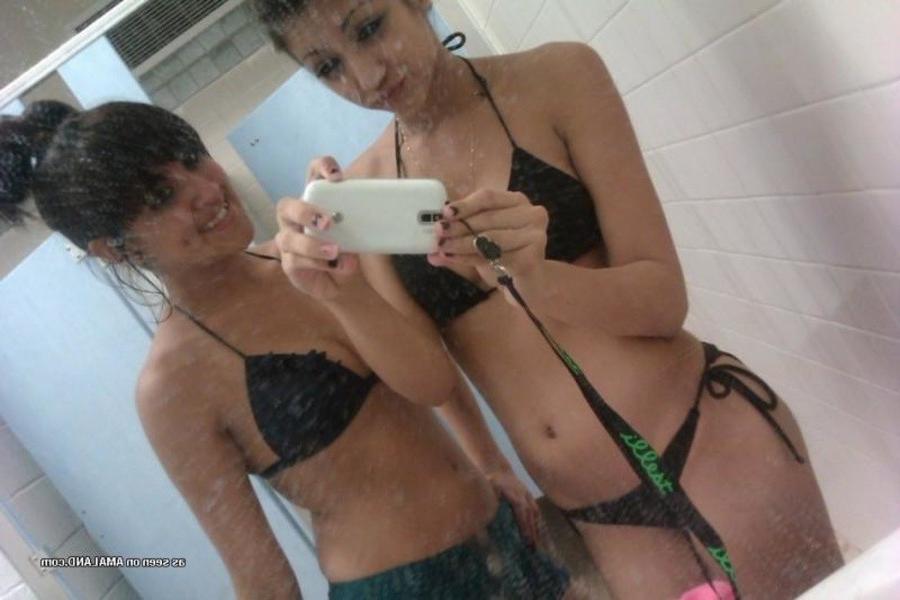 11P Gallery of a lovely brunette teen taking pics with her bff