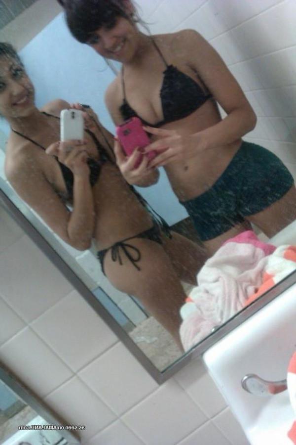 11P Gallery of a lovely brunette teen taking pics with her bff