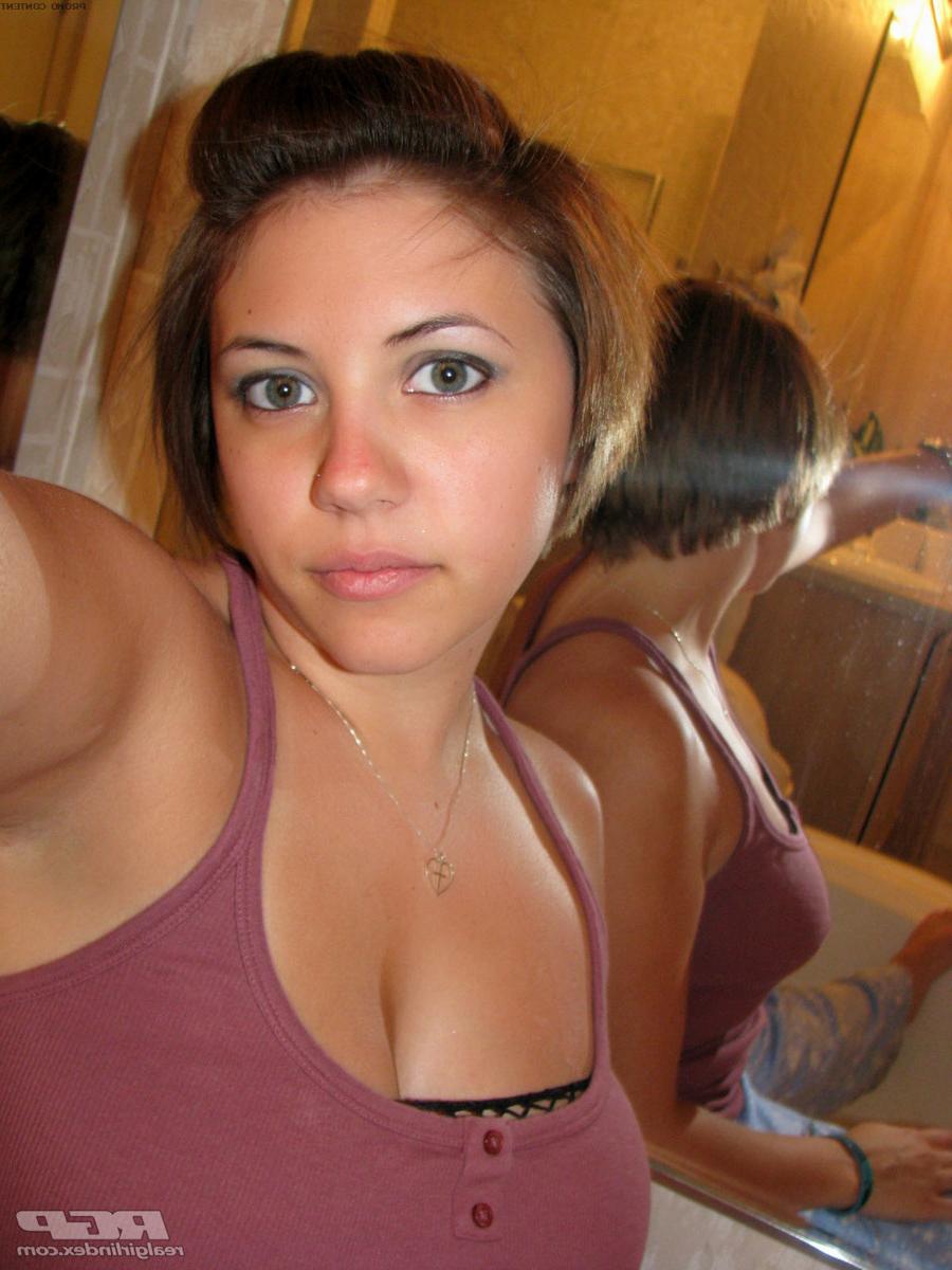 15P Lovely teen wearing a see through fishnet top and panties