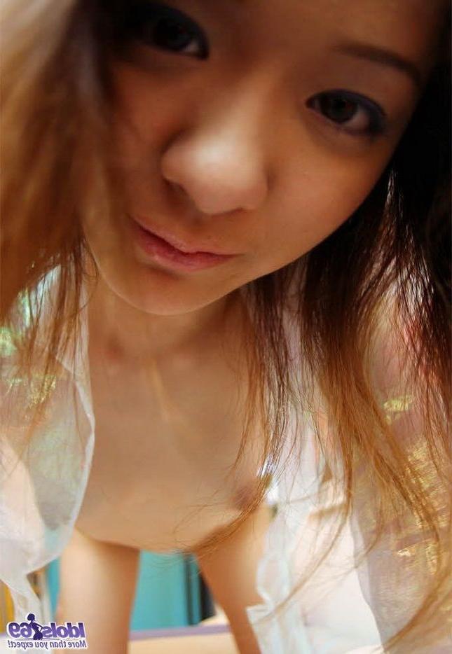 15P Lovely japanese teen Izumi shows hot ass in thongs